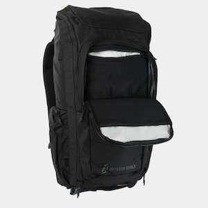 A black backpack that has its top compartment opened. The zippered flap of the compartment is folded down to reveal zippered storage pouches on the inside of the compartment and on the pack of the flap. Adventure Backpack by Outdoor Vitals.